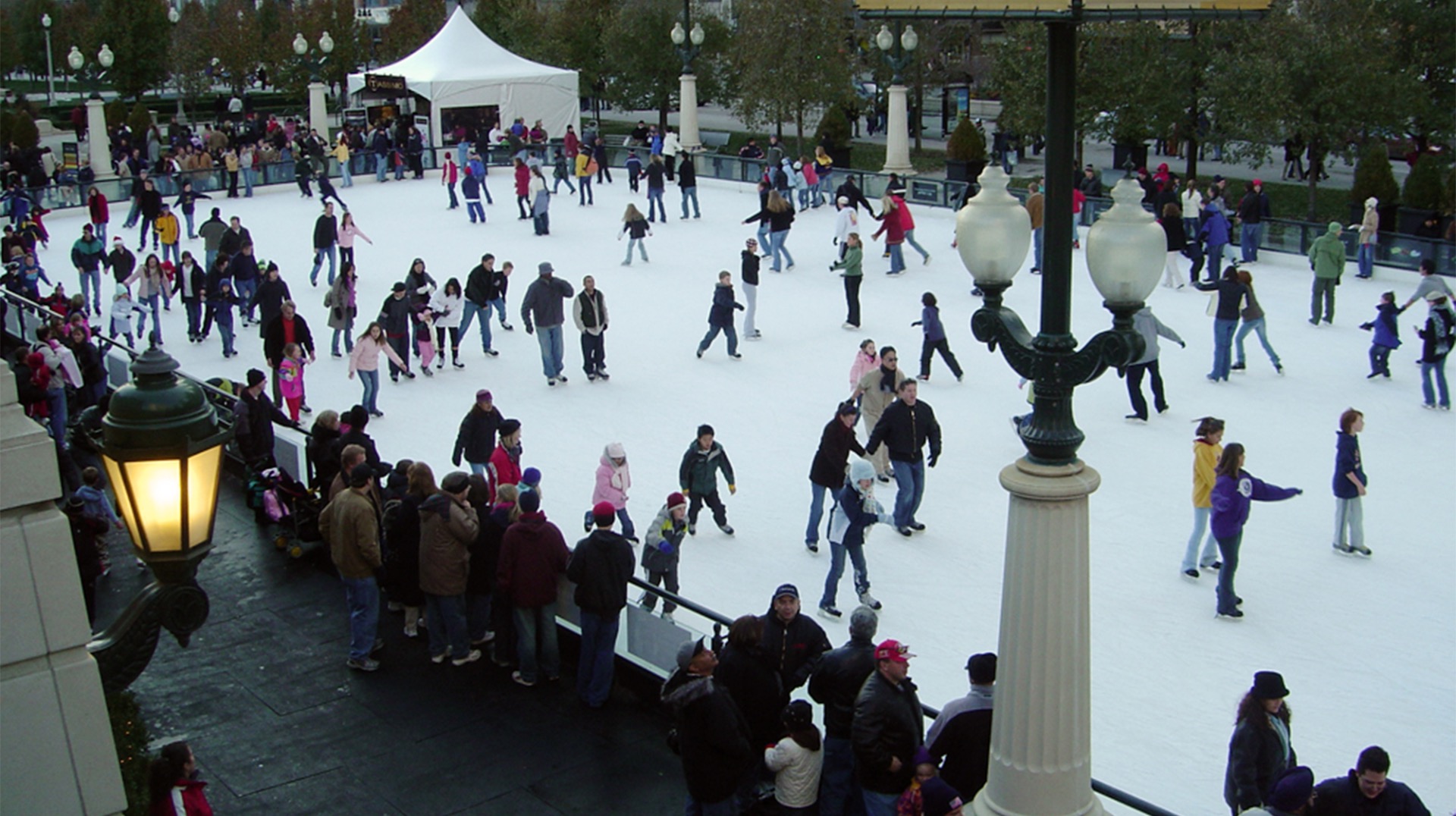 Ice skating at Millennium Park with Chicago skyline